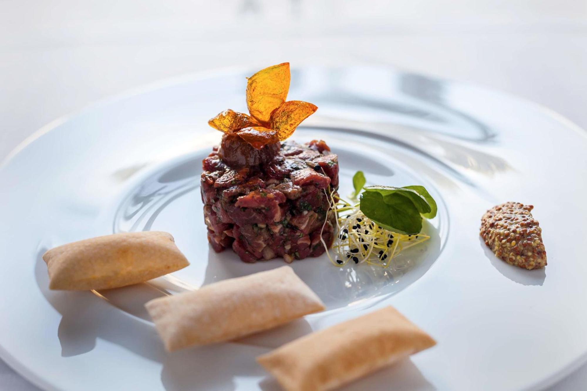 Barcelo Emperatriz Hotel Madrid Exterior photo A steak tartare